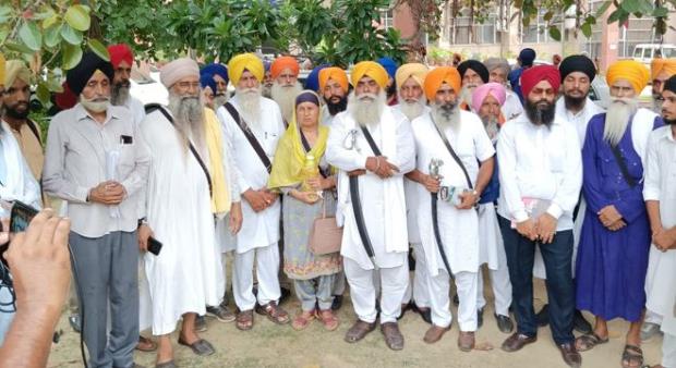 Sikhs protest the cutting of a prison inmate's hair; seek action from officials