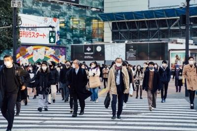 Japan's daily Covid-19 cases hit record high of 250,403