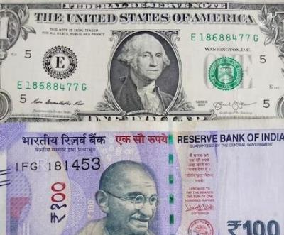 Rupee plunges 63 paise to close at new record low