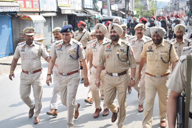 Pathankot police conducts flag march to uphold communal harmony in the district