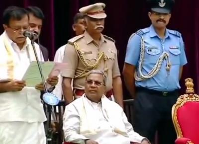 24 ministers take oath in K'taka, CM Siddaramaiah says allotment of portfolios in 24 hours